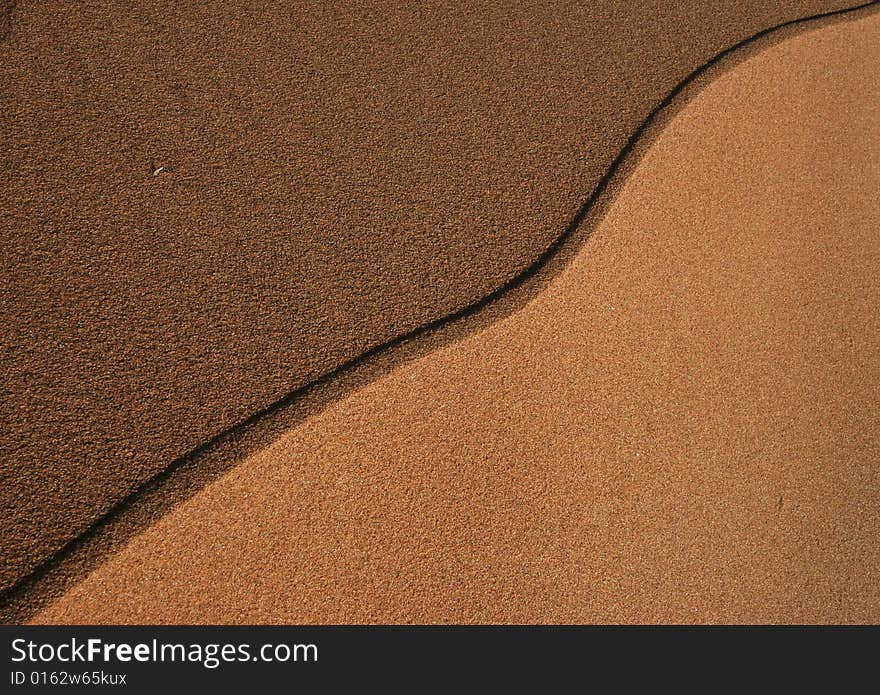 The sand dune.