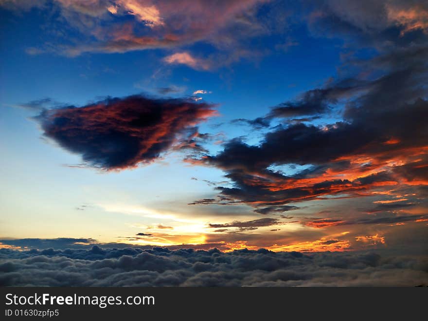 Sunset cloudland view on hill