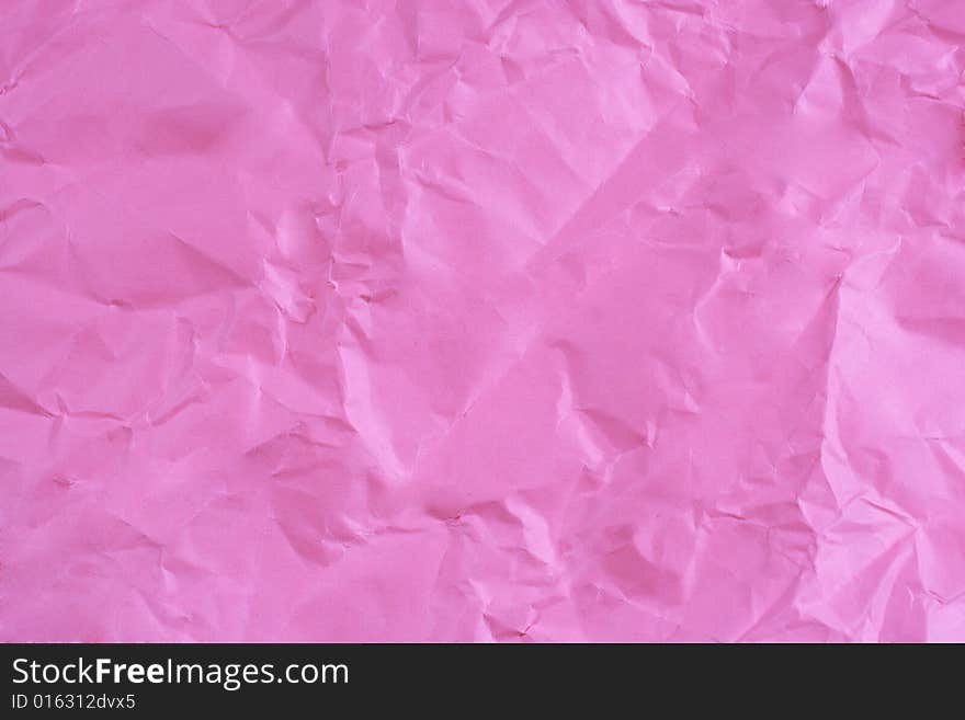 Crumpled pink paper (as a background)