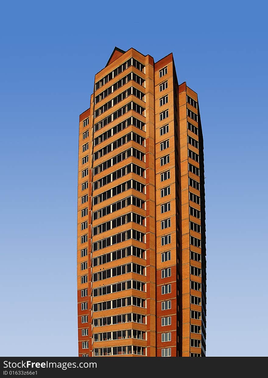 New modern building at blue sky background