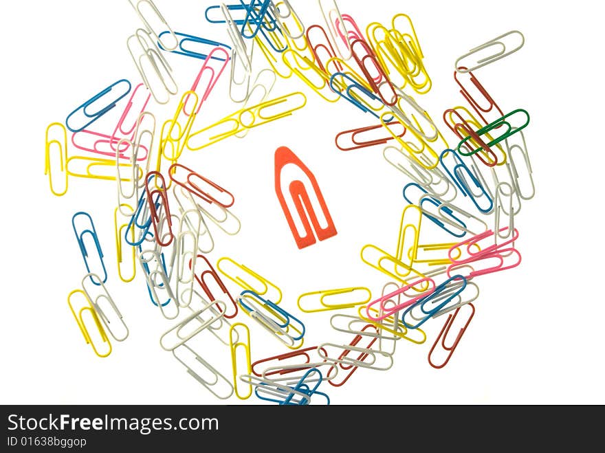 Red Paperclip In A Group Of Small Paperclip