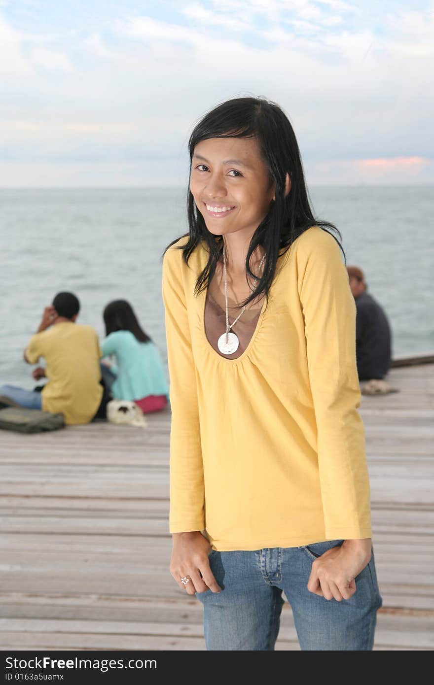 Girl fun at pier at evening