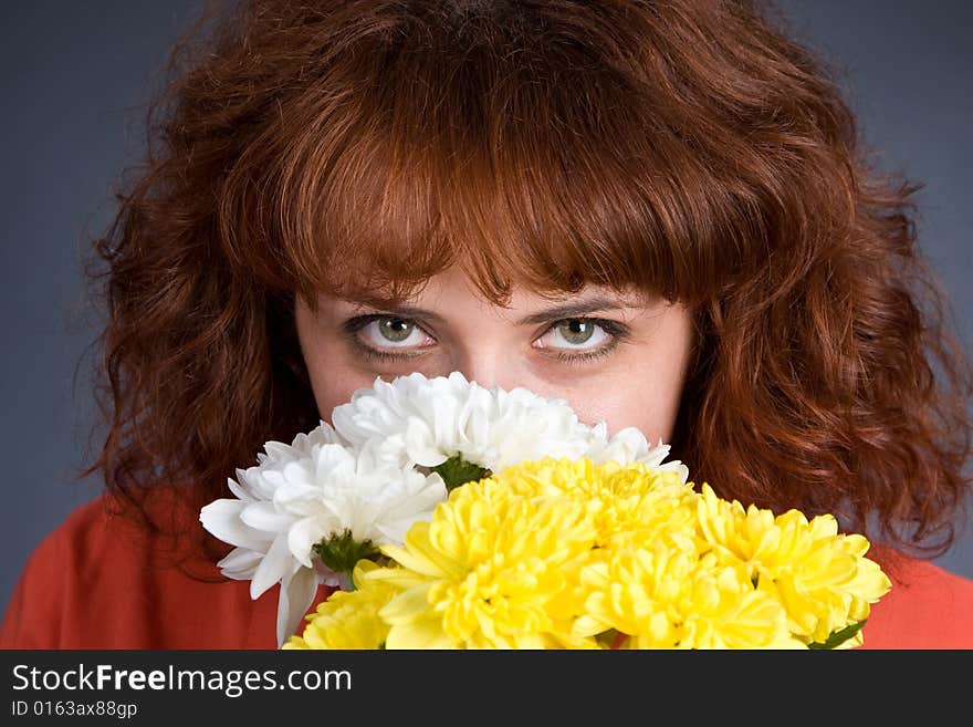 Eyes of the girl. Flowers.