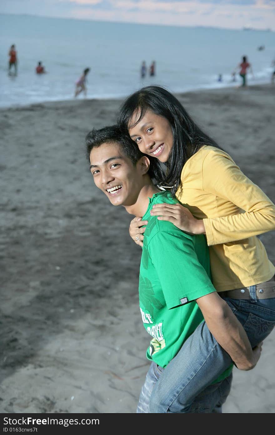 Couple fun on beach at evening. Couple fun on beach at evening