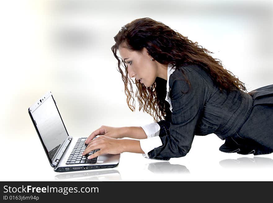 Beautiful female working on laptop on an abstract  background