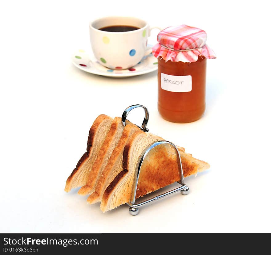 Coffee,toast and jam on a white background. Coffee,toast and jam on a white background