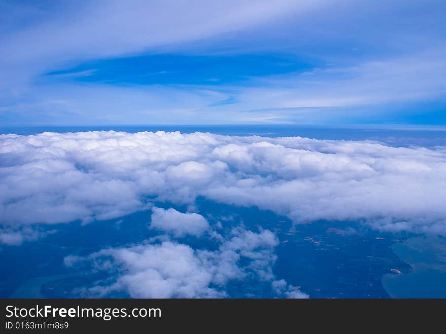 Bangkok overview from high blue sky with white clouds. Bangkok overview from high blue sky with white clouds