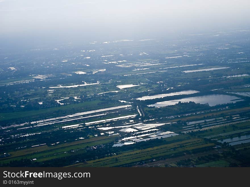 Bangkok overview from high blue sky with white clouds. Bangkok overview from high blue sky with white clouds