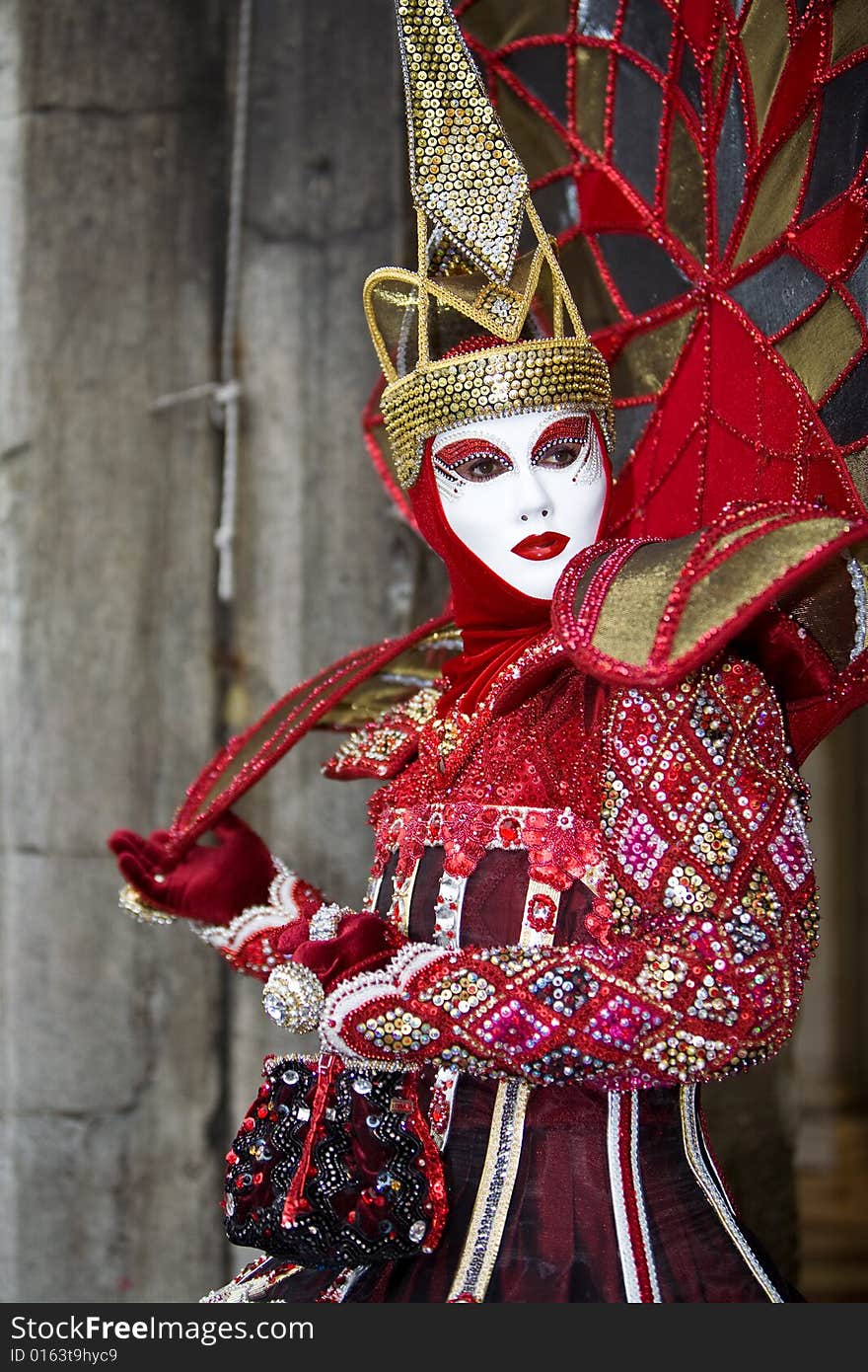 Red and Gold costume a the Venice Carnival. Red and Gold costume a the Venice Carnival