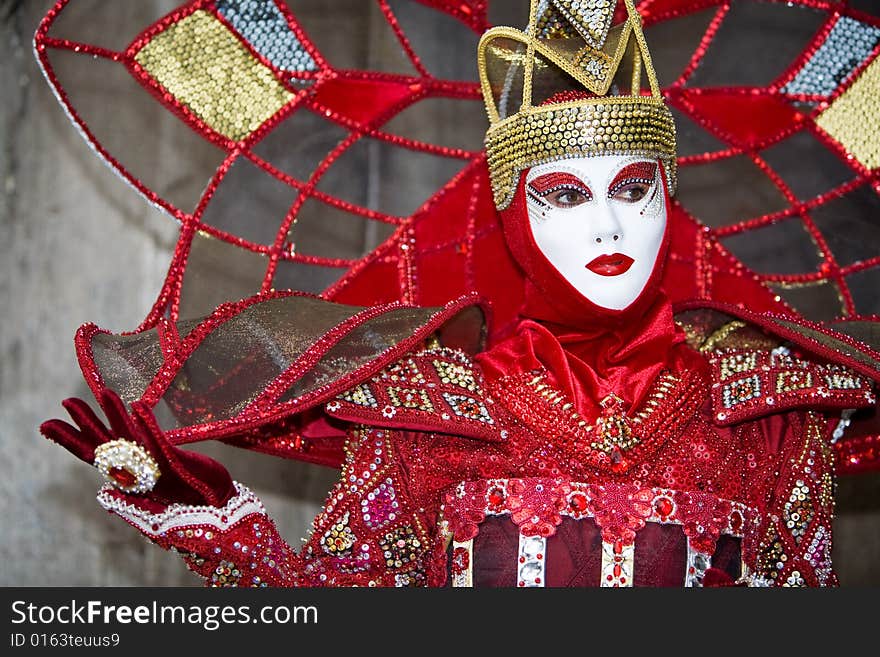 Red and Gold costume a the Venice Carnival. Red and Gold costume a the Venice Carnival