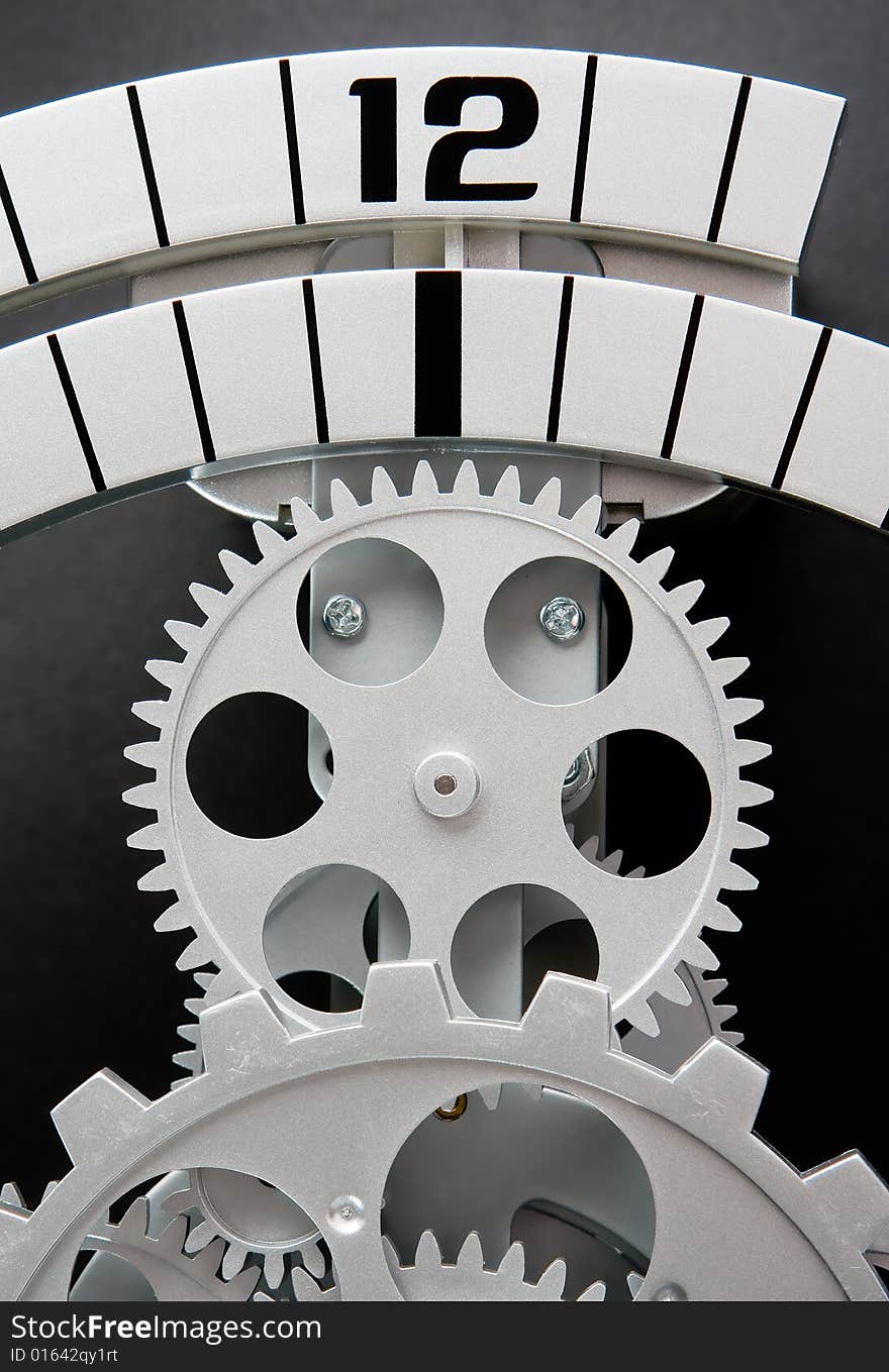 Part of a clockwork with a dial