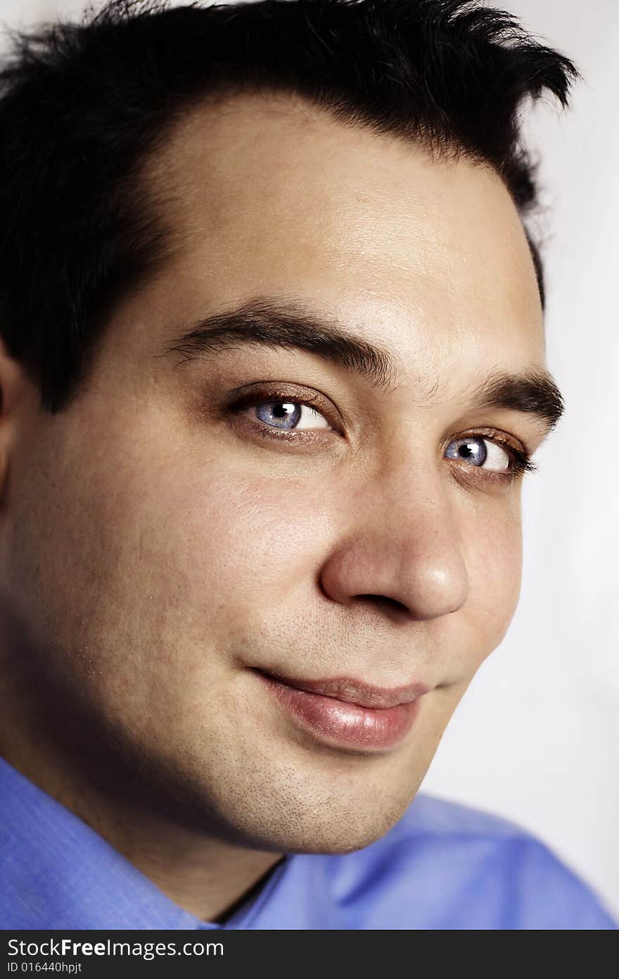 Attractive man portrait, closeup,looking at camera