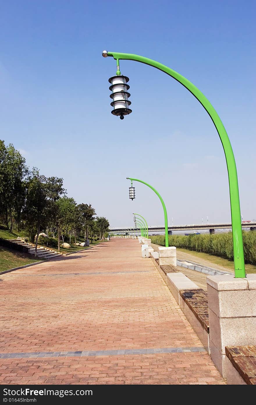 The street lamp with the blue sky background.