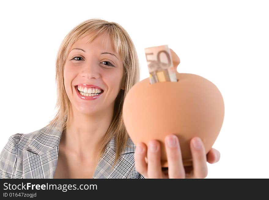 Young smiling woman holding a piggy bank