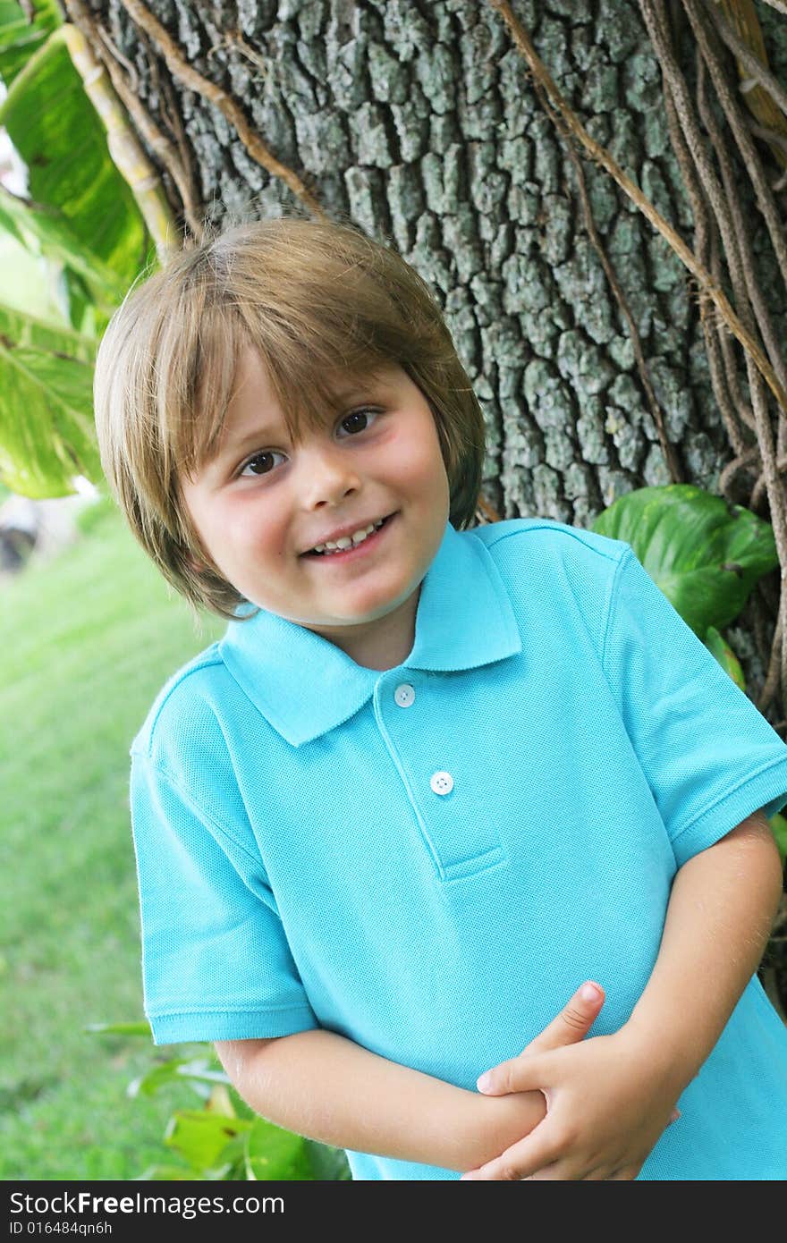 Shot of a happy cute little boy outside