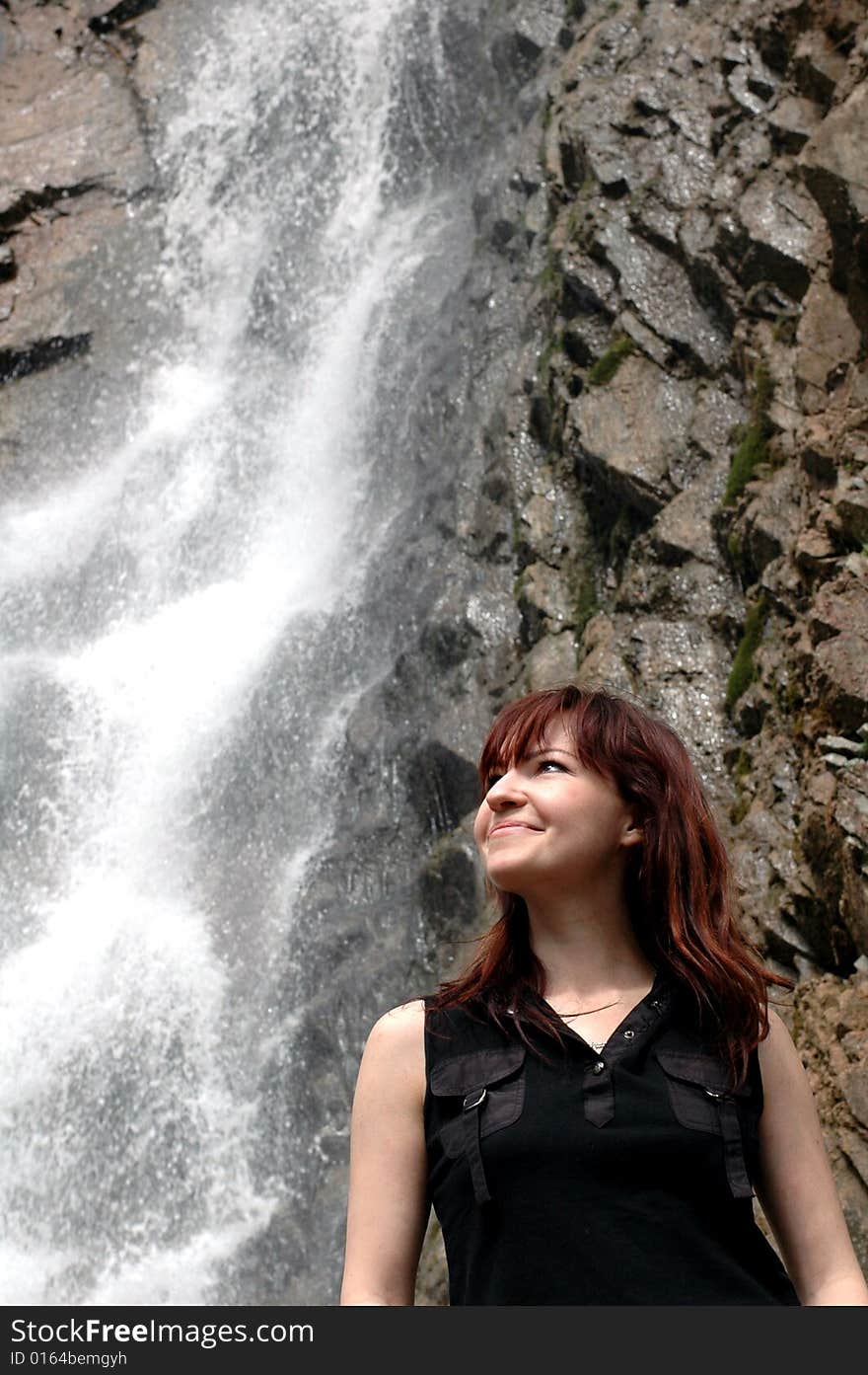 Girl and waterfall