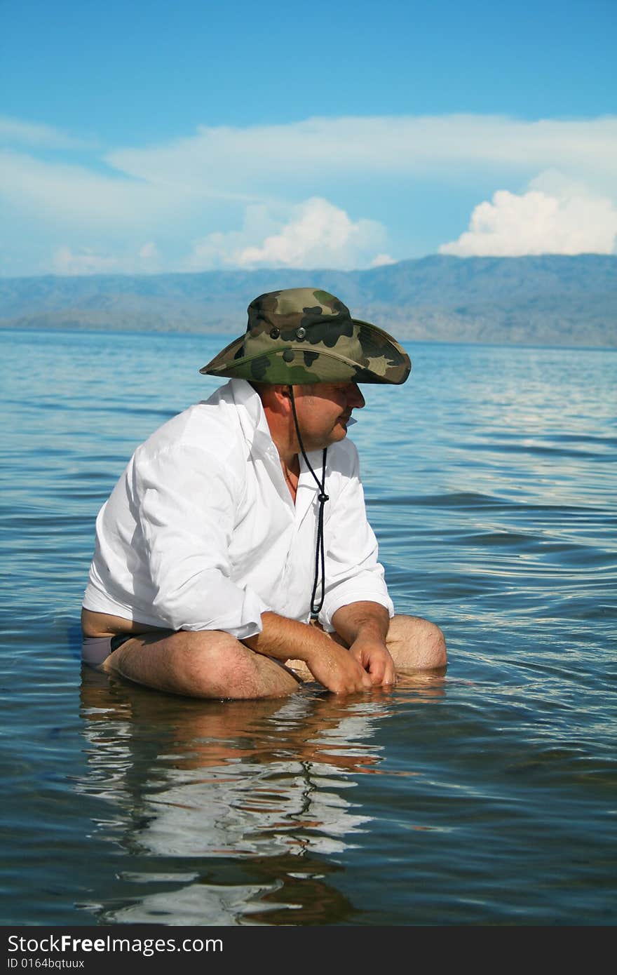 Contemplation Men resting in Water and smile