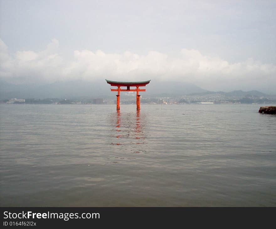 The floating gate at Miyajima in Japan.  Hiroshima can be seen in the background.