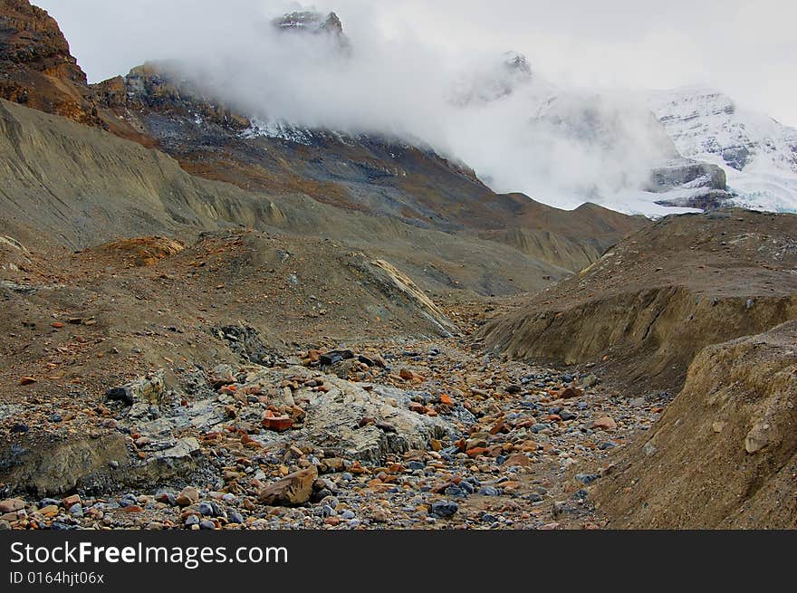 Glacier moraine in the mountain in the early fall