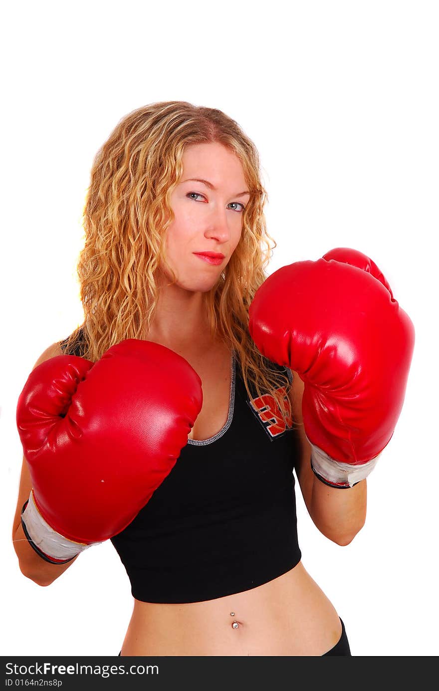 Young woman wearing boxing gloves