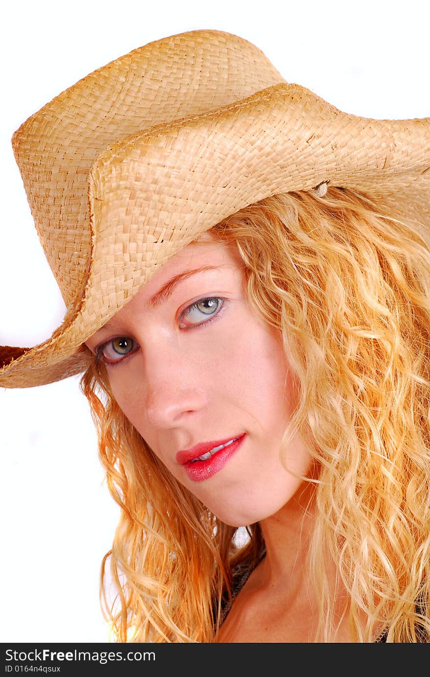 Young woman wearing a straw hat