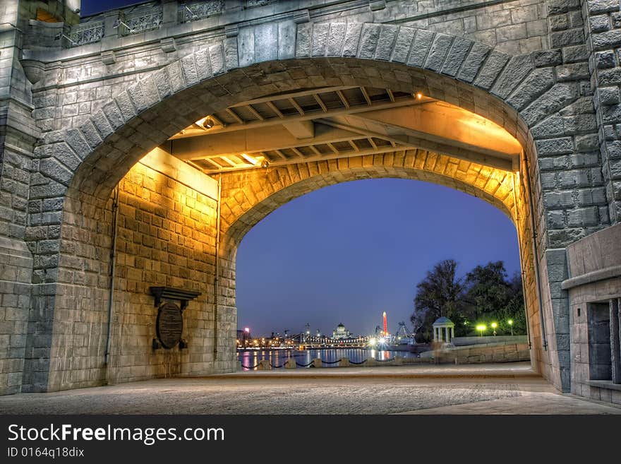 Arch of the Andreevsky foot bridge in Moscow. Nightscene