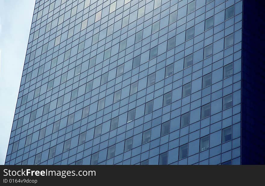 Great low angle view of a modern steel and glass building. Great low angle view of a modern steel and glass building