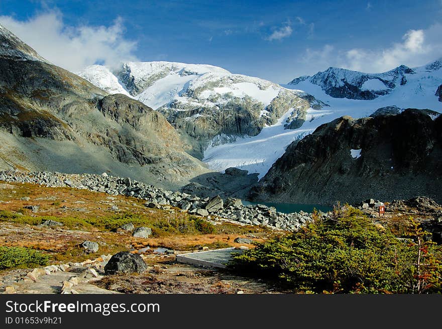 Glacier moraine in the mountain in the early fall