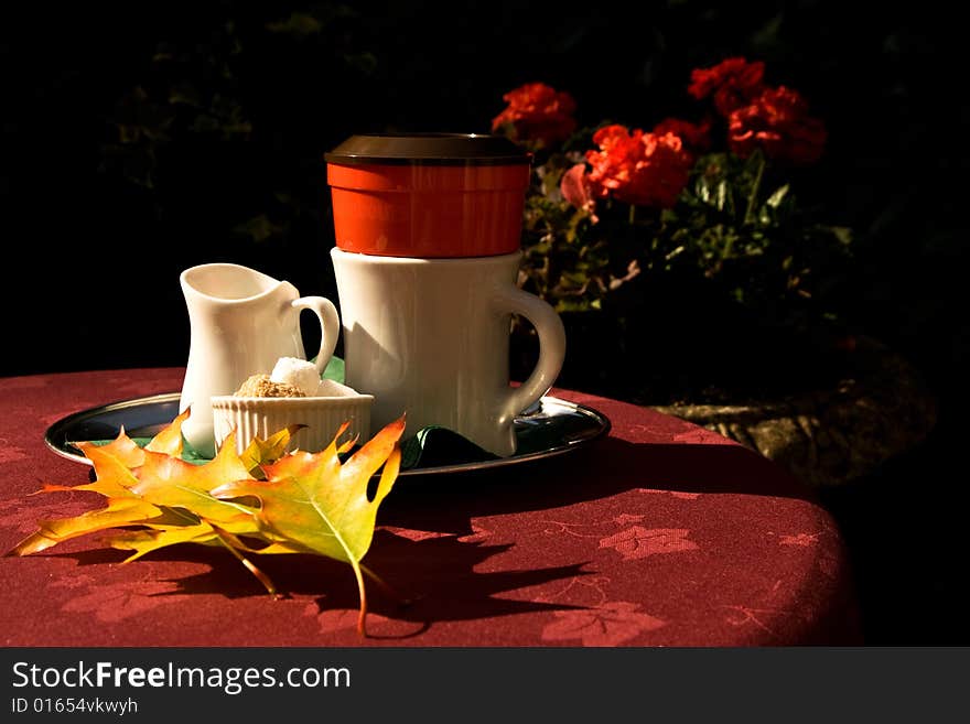 Autumn tea and milk on the table