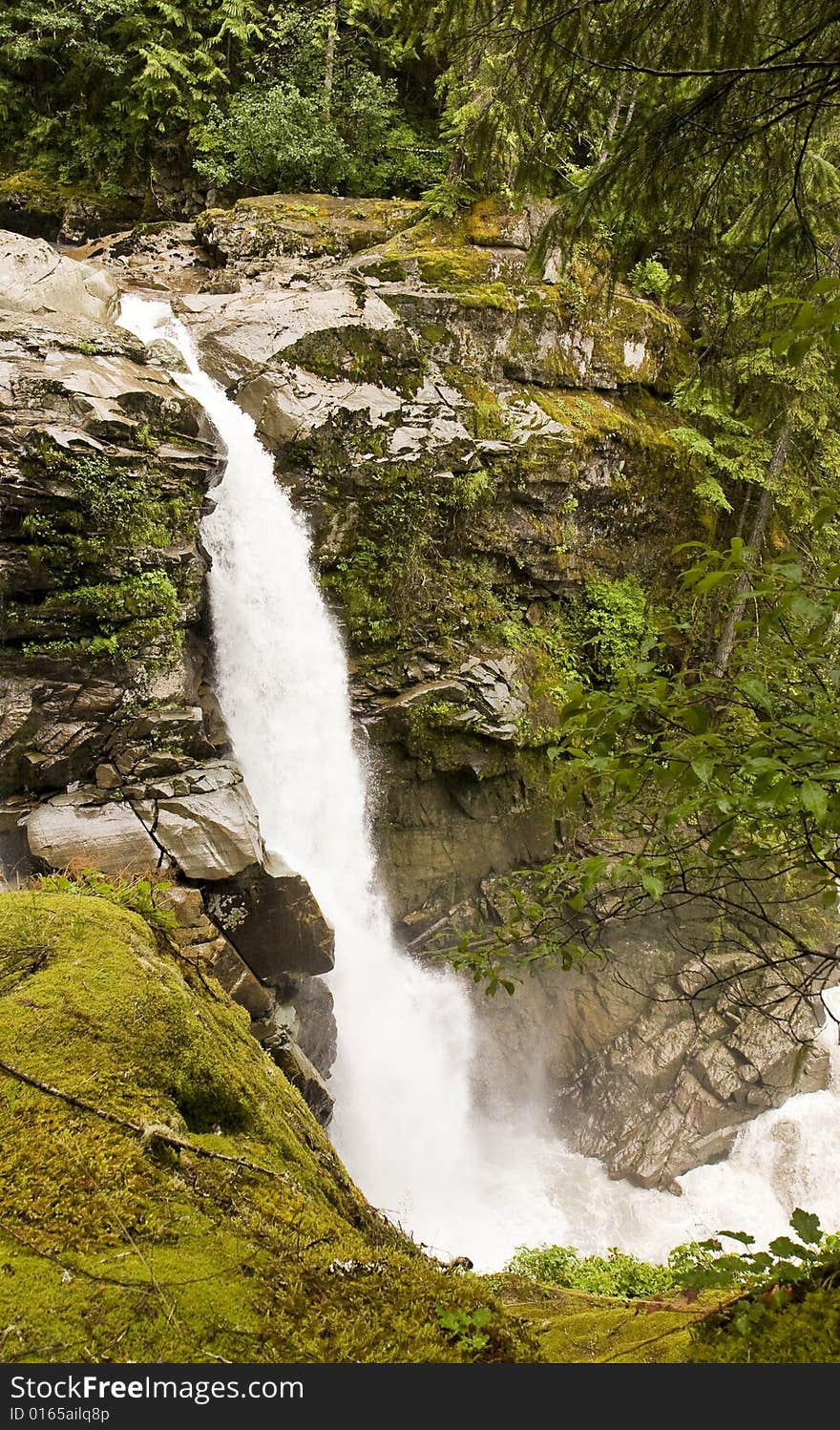 Waterfall Over Mossy Rocks