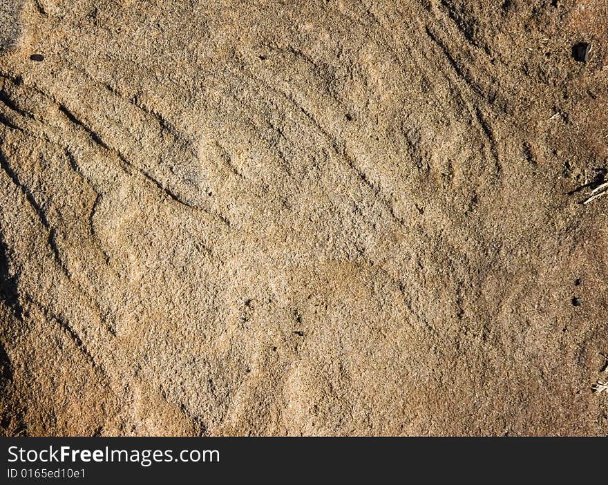 Gritty golden sand stone texture. Gritty golden sand stone texture