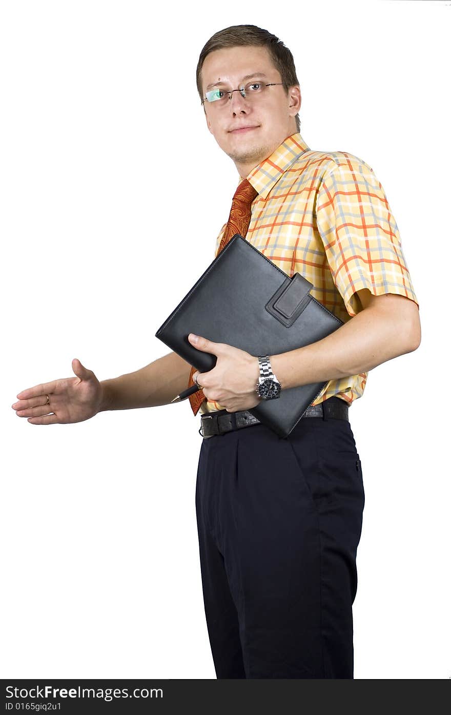 Young, elegant European businessman, wearing suit, shirt and tie. Smiling friendly. Holding notebook, ready to shake hands with business partner. Young, elegant European businessman, wearing suit, shirt and tie. Smiling friendly. Holding notebook, ready to shake hands with business partner