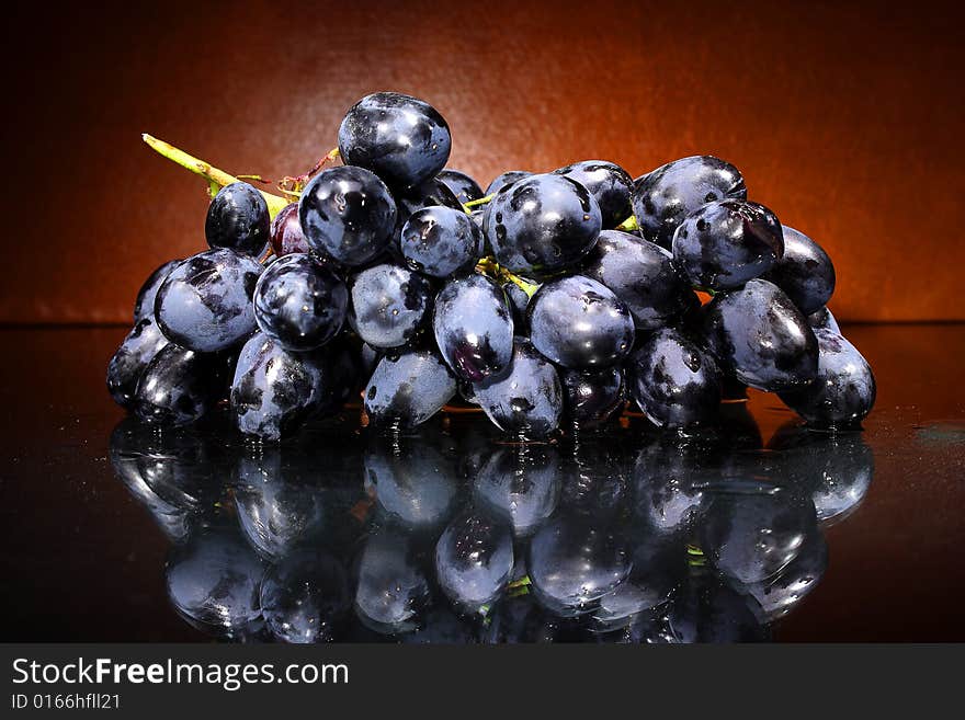 Black grapes on a dark background