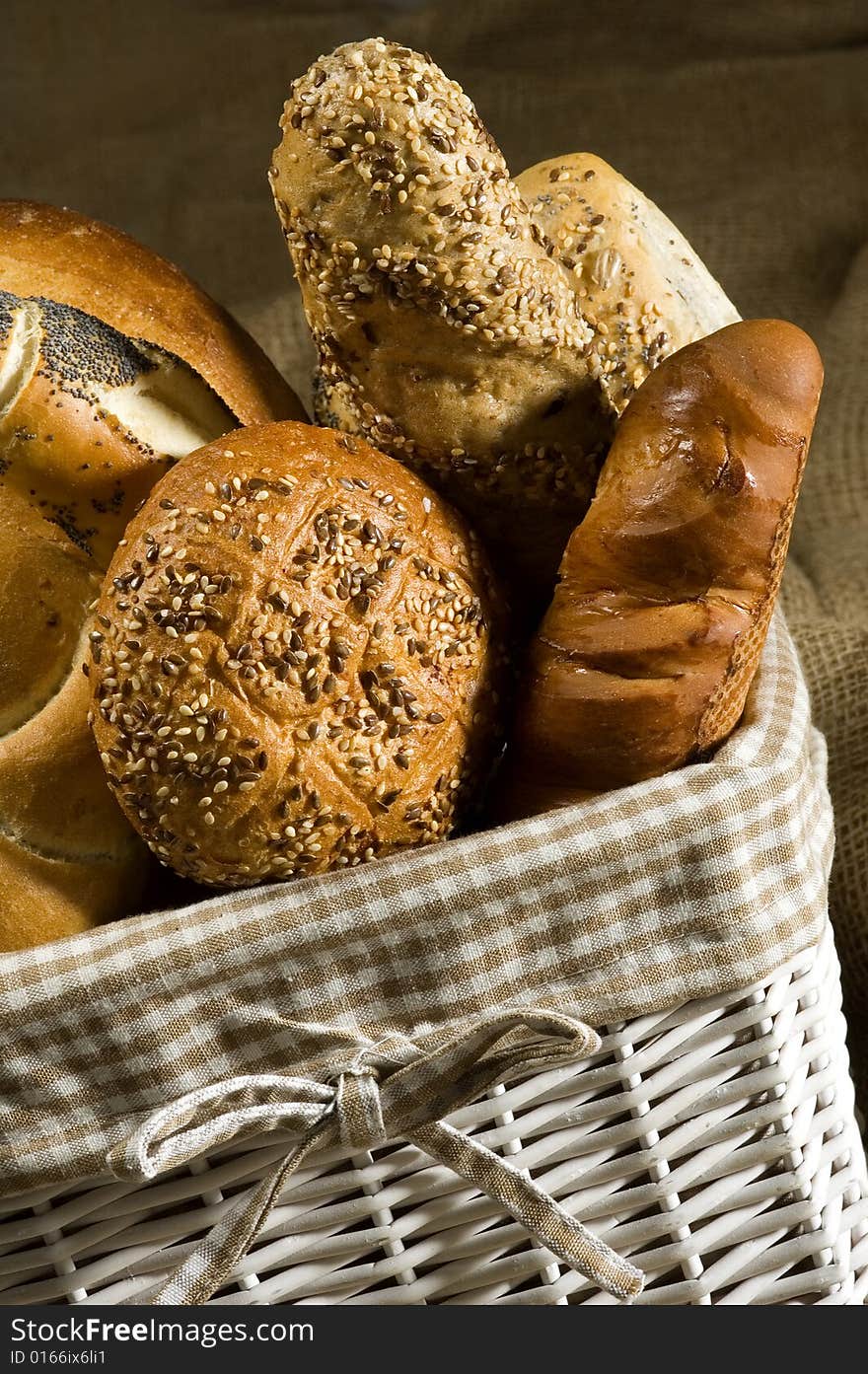 Bread and buns in a white basket