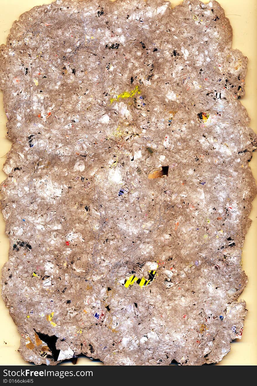 Texture of a wet cardboard with multi-coloured stains