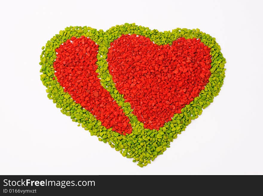 Hearts with little colored stones on white background. Hearts with little colored stones on white background