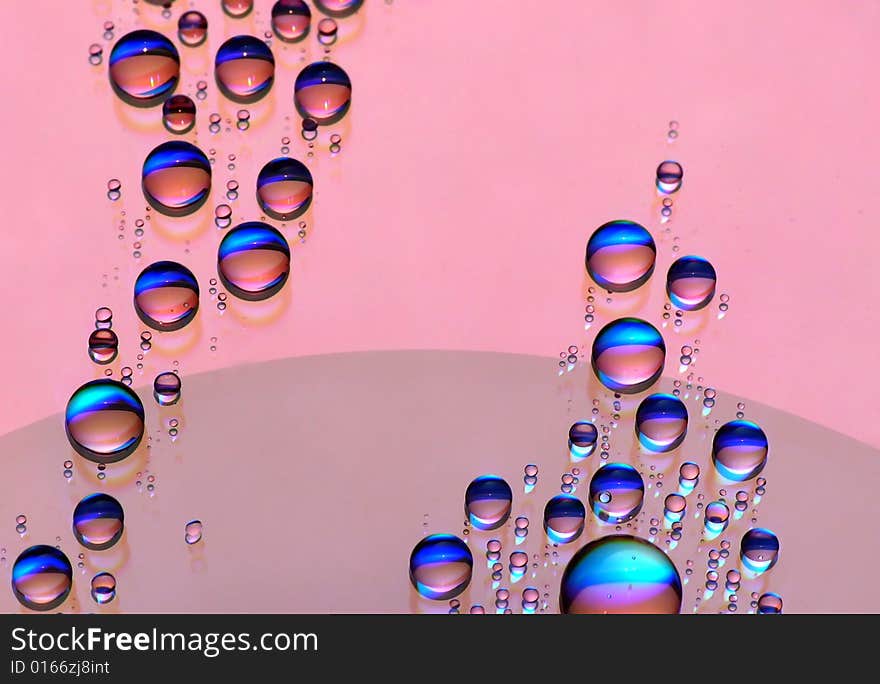 Colorful water drops on CD