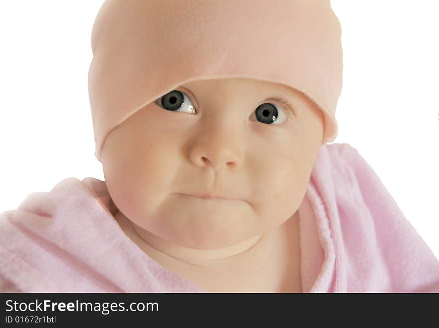 Cute big-eyed baby girl looking up with curious facial expression, on white background. Cute big-eyed baby girl looking up with curious facial expression, on white background