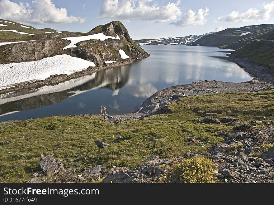 A landscape south of Vik/Sognefjord, up in the mountains, in the summer, with some kids. A landscape south of Vik/Sognefjord, up in the mountains, in the summer, with some kids.