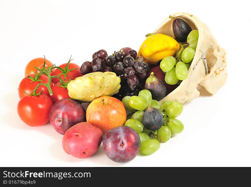 A human skull overflowing with fruits and vegetables, from behind. A human skull overflowing with fruits and vegetables, from behind.