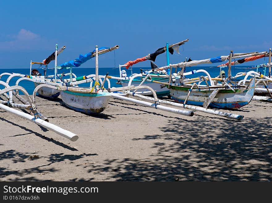 Photo of traditional boats on the beach