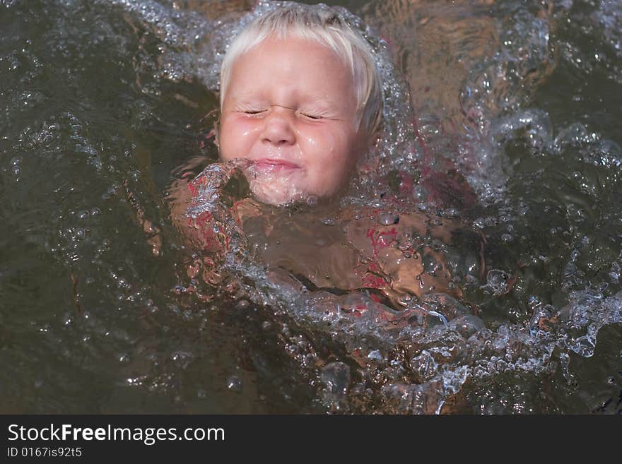 Girl swimming in the water. Girl swimming in the water