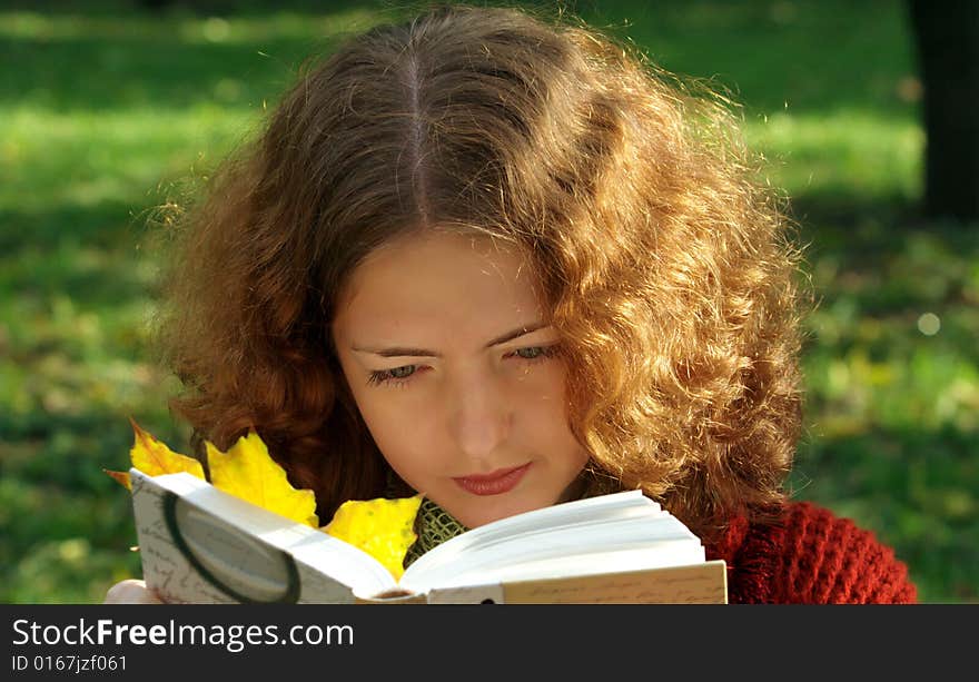 Girl is reading a book