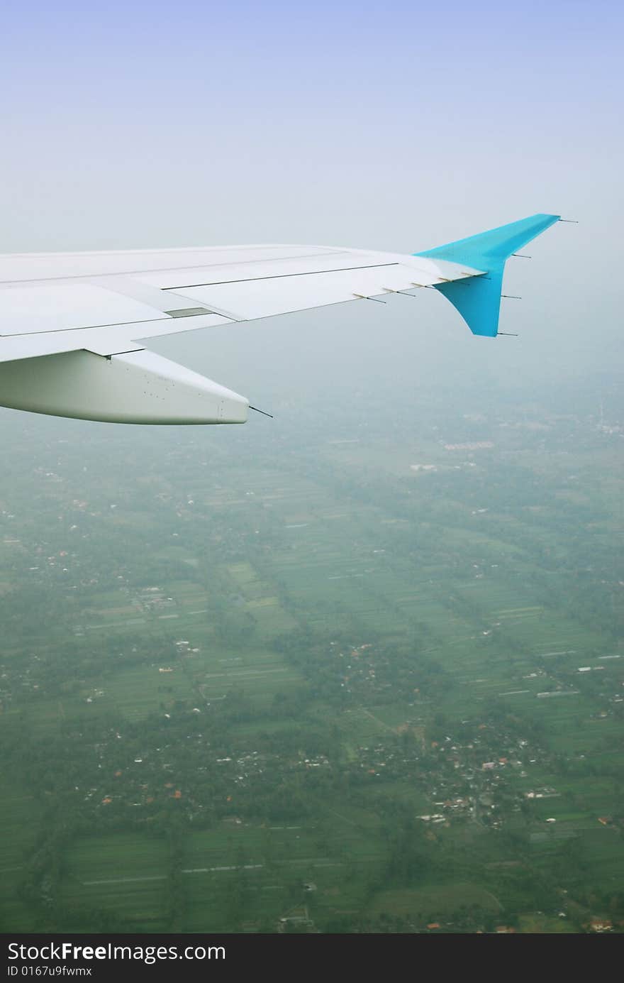 Airplane S Wing On A Cloudy Sky