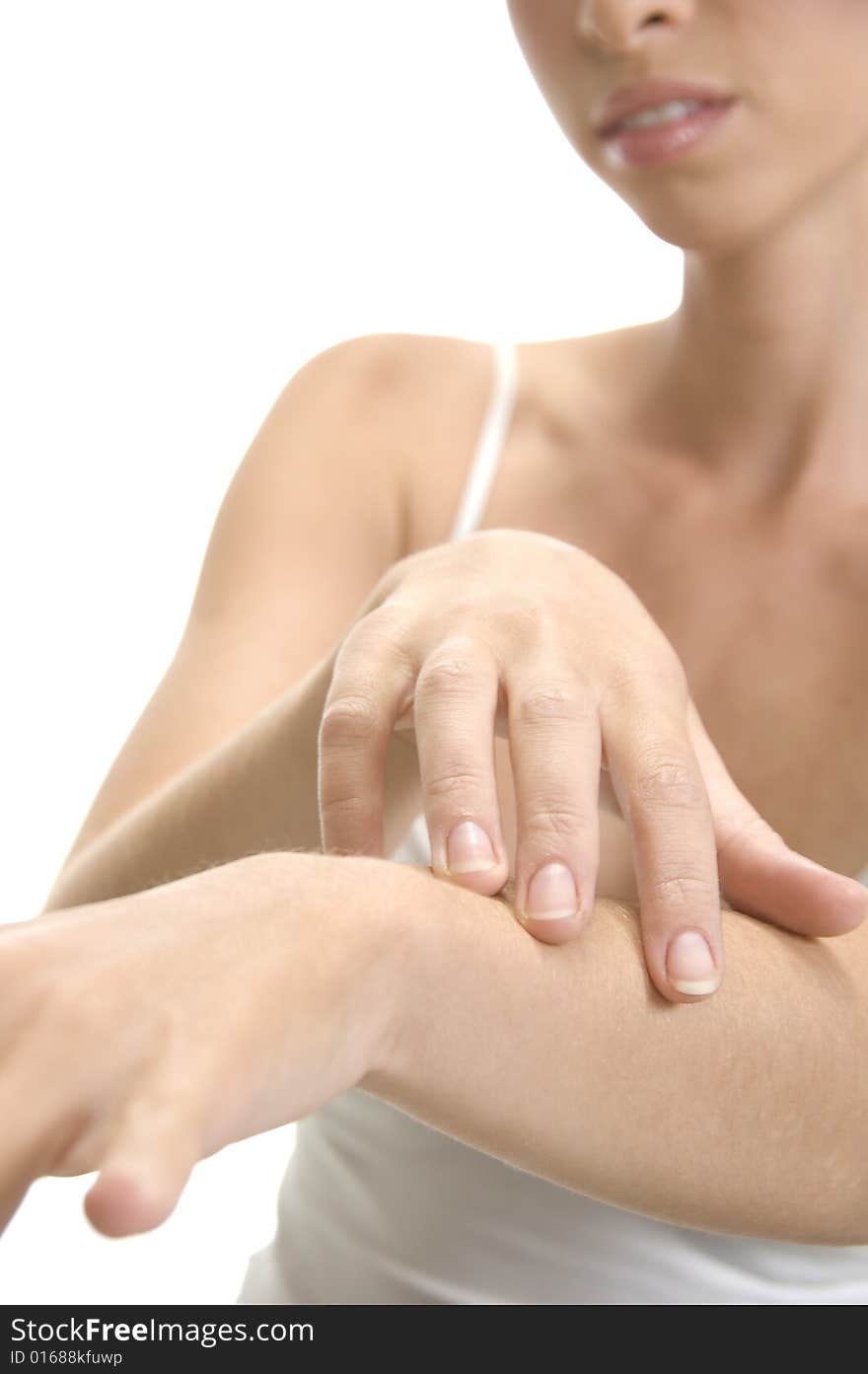 A white woman doing hand massage