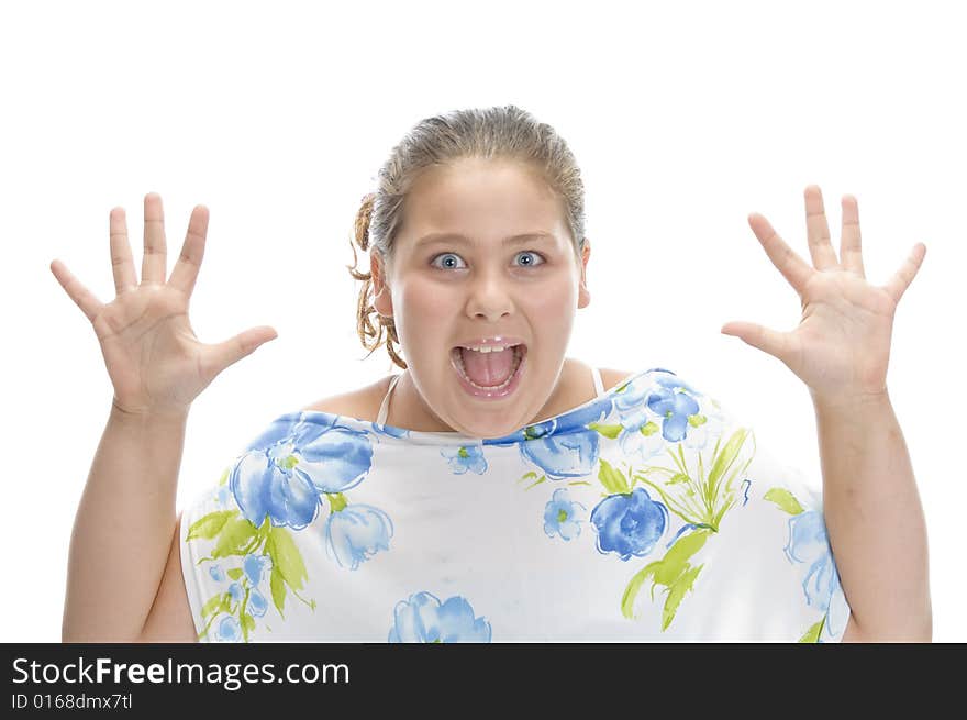 Surprised young girl against white background