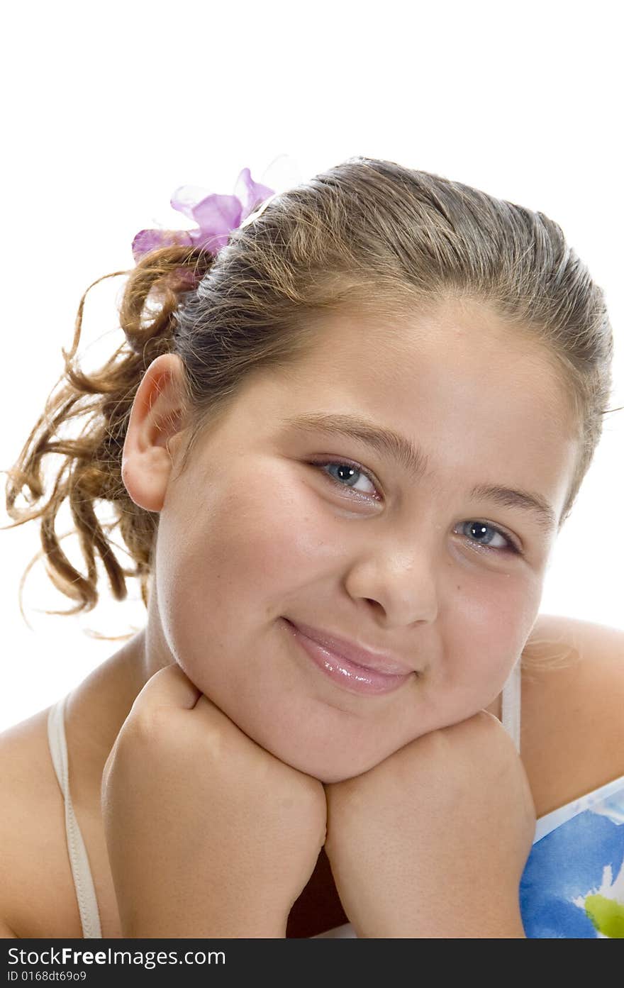 Portrait of young girl against white background