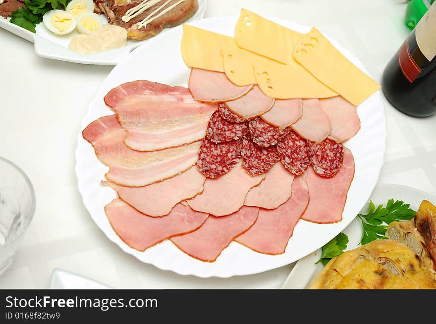 Table served with different dishes. Table served with different dishes