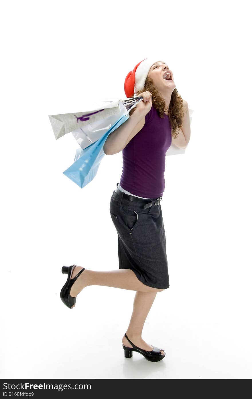 Cheerful lady holding carry bags with white background