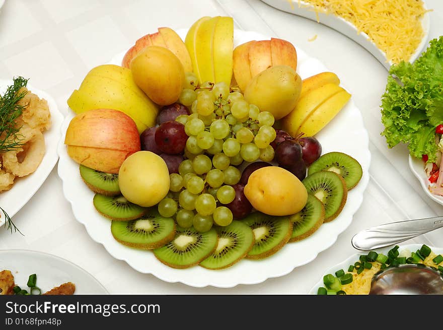 Table served with different dishes. Table served with different dishes